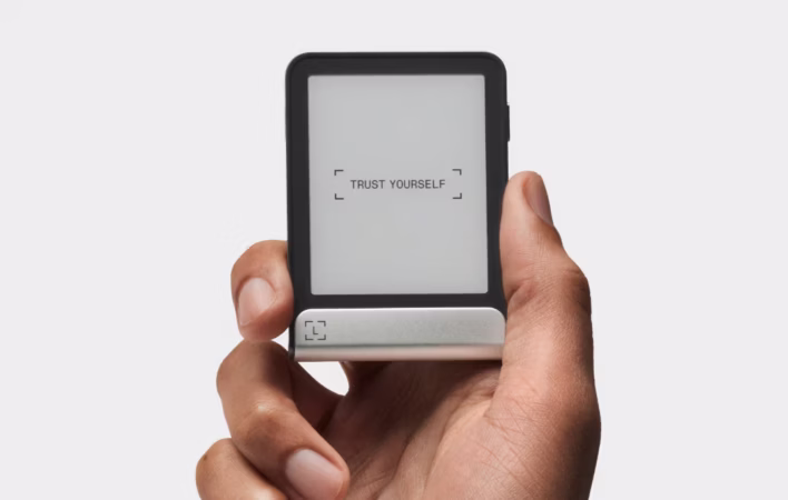 Hand Holding the Ledger Flex Hardware Wallet